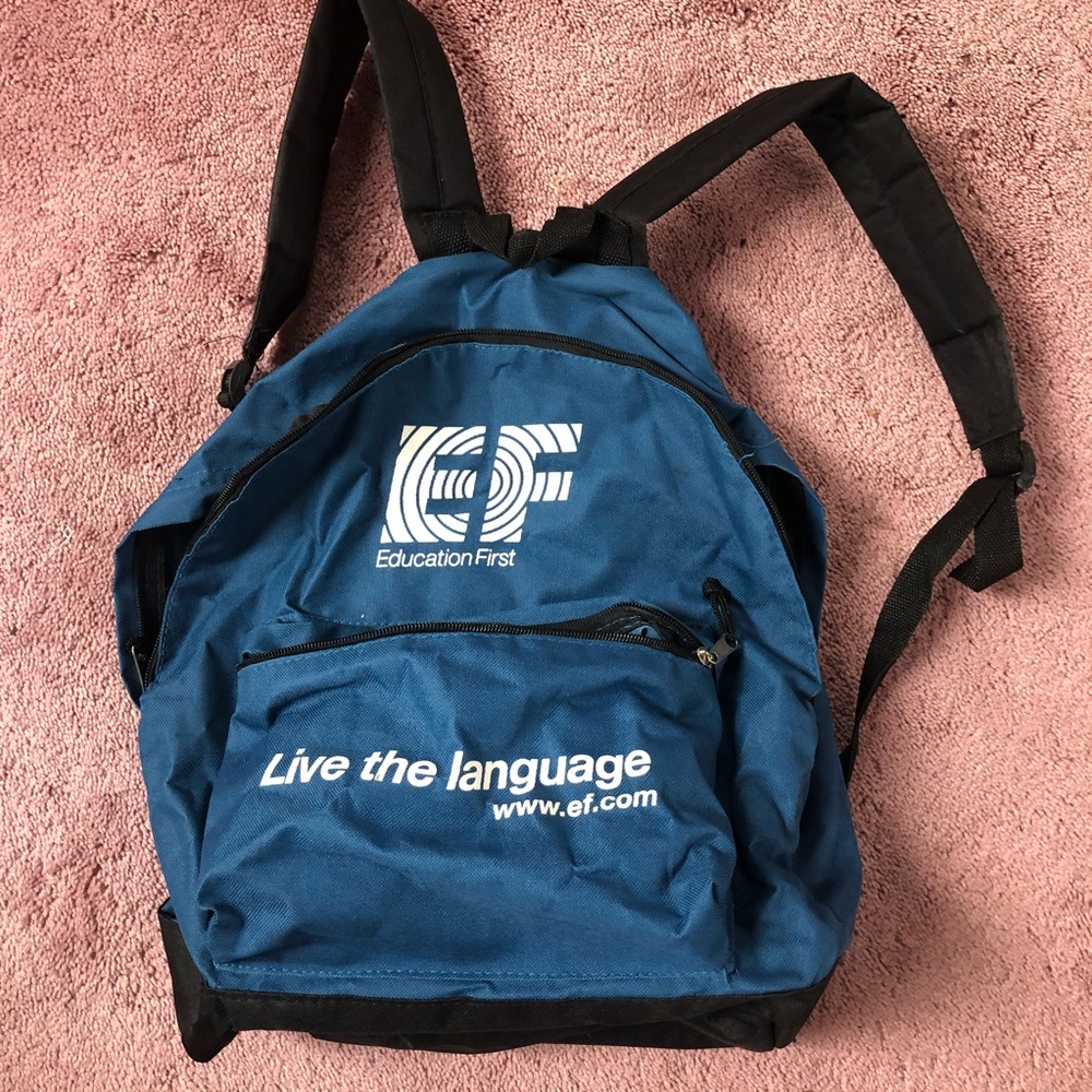 Education First Blue & White Backpack (small rip) - Picture 1 of 4